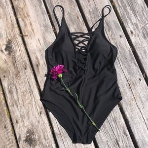 Black plunge one piece bathing suit